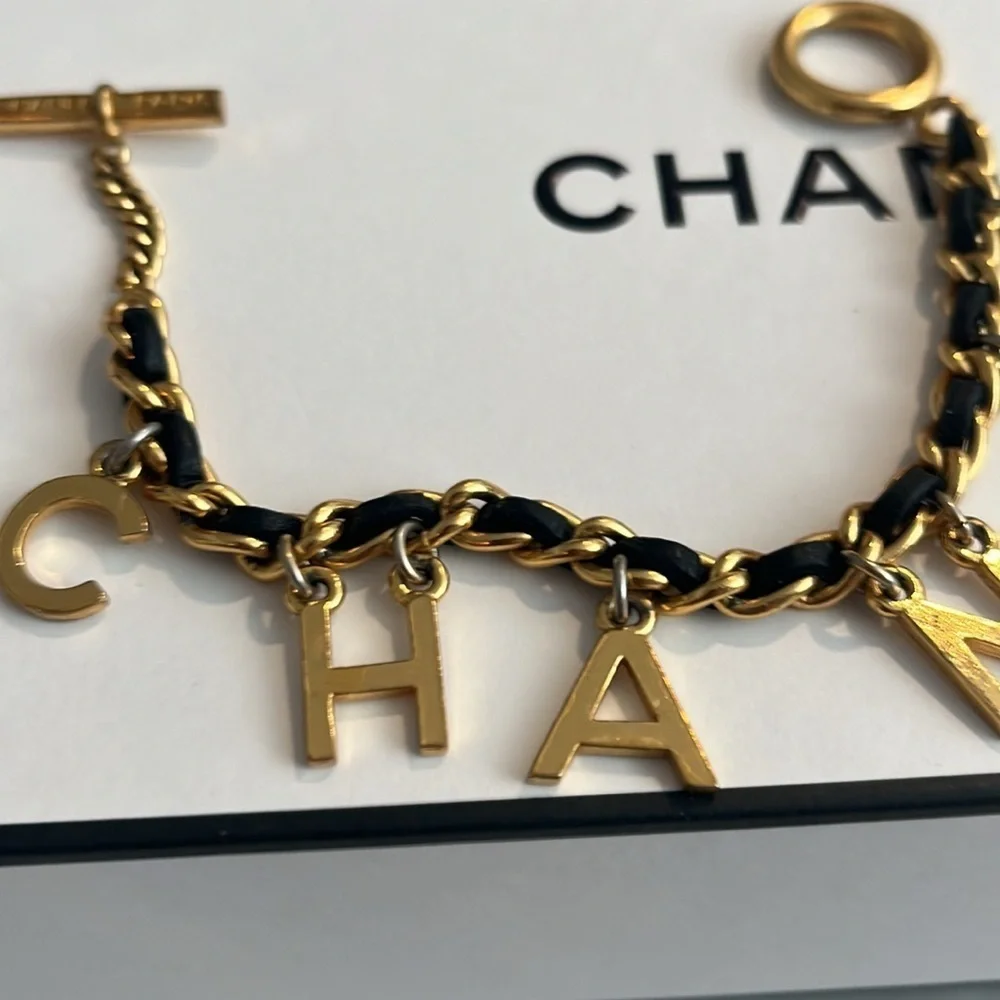CHANEL RARE VINTAGE TOGGLE LEATHER CHARM BRACELET